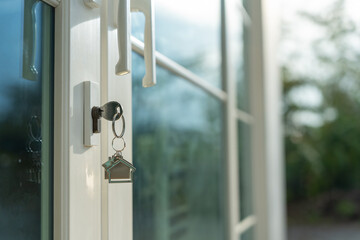 Landlord key for unlocking house is plugged into the door. Second hand house for rent and sale....