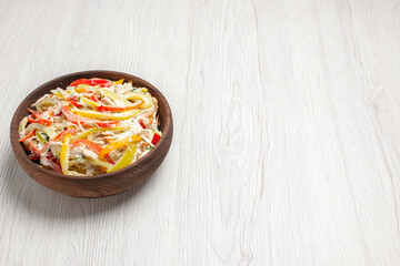 front view chicken salad with mayyonaise and sliced vegetables inside plate on a white desk fresh salad meat meal snack