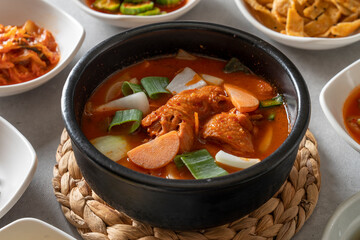 Korean food dish Set Menu of Napa Wraps with Pork Set Menu with Braised Fish Soft Tofu Stew Stir-fried chicken in earthen pot Set Menu with Marinated Beef Ribs