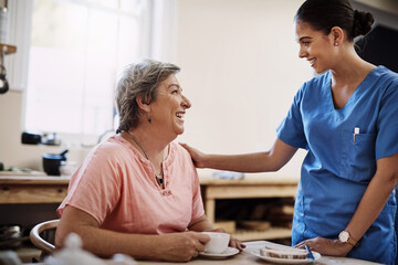 Thanks for always being by my side. an attractive young female caregiver with a senior patient in a...