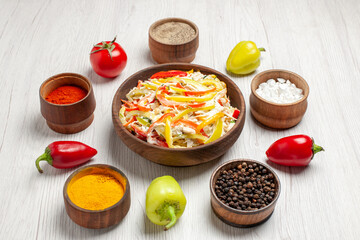 front view delicious chicken salad with different seasonings on a white desk snack ripe meal meat fresh