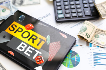 graph sketch and modern digital tablet on background, strategy and forecast concept.