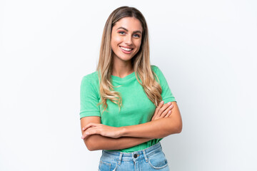 Young Uruguayan woman isolated on white background keeping the arms crossed in frontal position