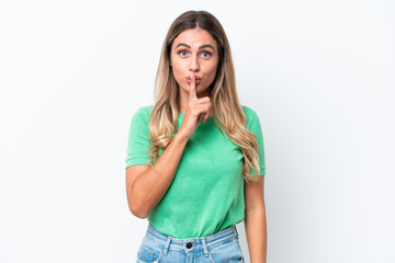 Young Uruguayan woman isolated on white background showing a sign of silence gesture putting finger...