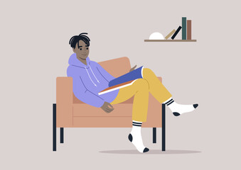 A young male African character reading a magazine at home, comfortable armchair and a bookshelf