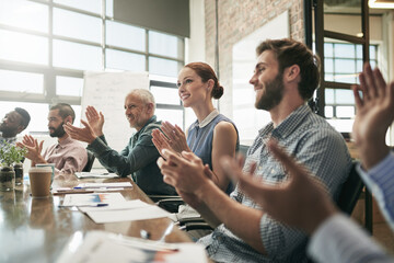 Meeting, achievement and applause with a business team in the boardroom in celebration of a target...