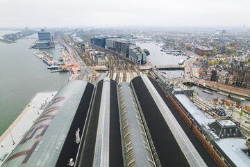 Aerial view of Central Station. The name of Amsterdam is written in huge letters on the roof of the central station. High quality photo