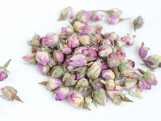 Dried french rosebuds isolated on white background