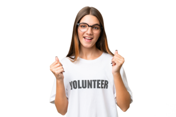 Teenager volunteer caucasian girl over isolated background celebrating a victory in winner position