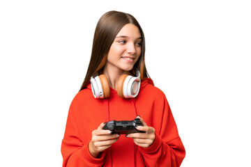 Teenager caucasian girl playing with a video game controller over isolated background looking to...