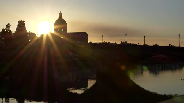 Florence. Tuscany. Italy 03-12-2023. Beautiful view of Lungarni di Pisa at sunset. Arno river. Silhouette. Video 4K