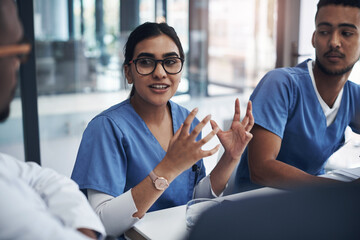 Healthcare, medical team in a meeting and talking in conference room. Medicine discussion or communication, teamwork or collaboration and doctors or nurses speaking about confidential patient data - Powered by Adobe