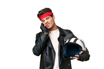 Young caucasian man with a motorcycle helmet over isolated background with headache
