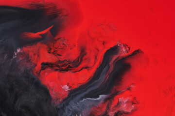 Abstract creative background liquid art, contrast paint stains and blots, red alcohol ink