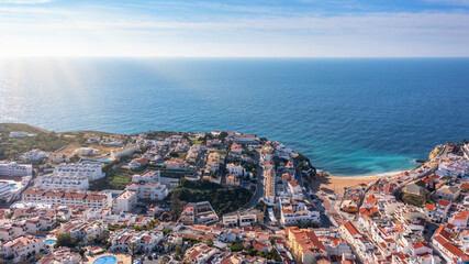 Aerial view of portuguese tourist village Carvoeiro Portugal Algarve in summer on a sunny day. Blue...