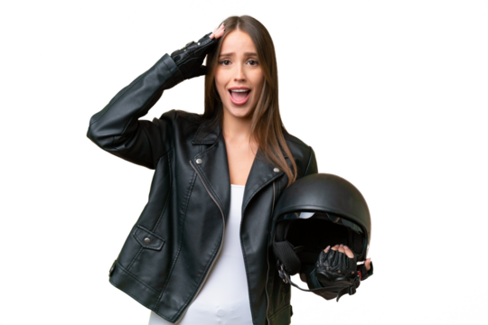 Young pretty caucasian woman with a motorcycle helmet over isolated background with surprise expression