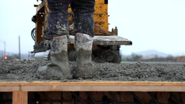 Bidwell concrete paving machine on bridge pan right