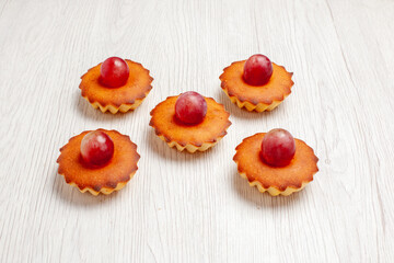 front view yummy little cakes for tea on white background dessert biscuit tea cake pie cookie