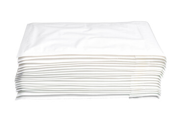 Stack of White Bubble Mailers on White Background