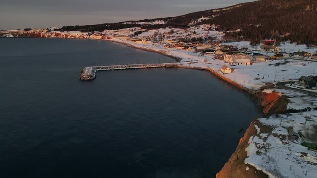 Perce village by drone in the spring when there is still some snow on the ground.