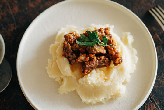 Tasty mashed potato with beef stroganoff hot dishes in lifestyle rustic style beautiful food image