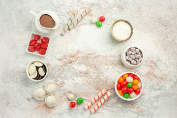Fototapeta na wymiar top view colorful candies with cookies on white background biscuit sweet cake cookie