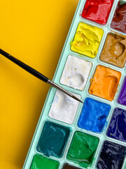 Set of watercolor-gouache paints, brush for painting