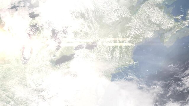 Earth zoom in from outer space to city. Zooming on Auburn, New York, USA. The animation continues by zoom out through clouds and atmosphere into space. Images from NASA