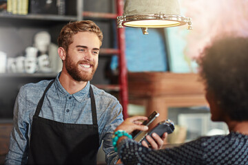 Man, barista and client with smartphone payment, cafe and transaction for services, smile and fintech. Female customer, male employee and happy guy at a coffee shop, small business and financial