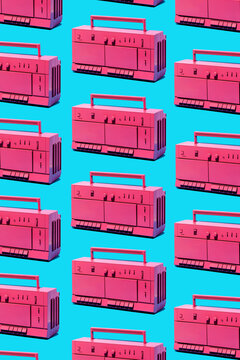 Similar vintage boomboxes against blue background