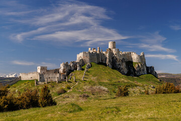 Old medieval castle on the green hill. © 9parusnikov