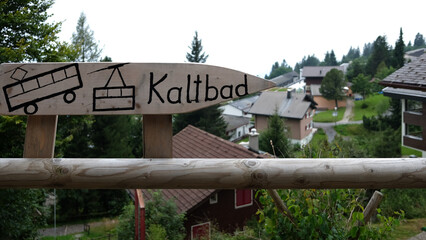 A sign for gondola lift in a town