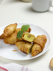 Molen banana is a traditional Indonesian snack, made from processed bananas wrapped in pastry and then deep-fried
