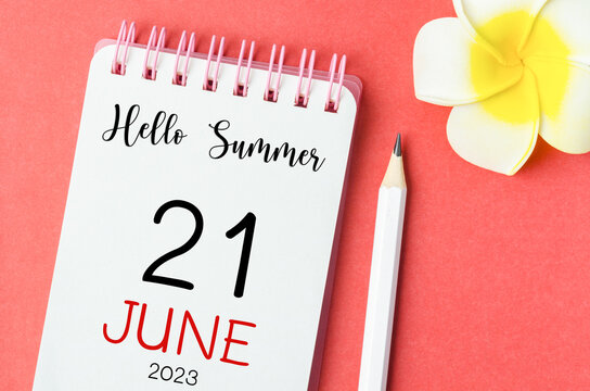 The Hello Summer on 21st June 2023 calendar and pen with flower on red background.