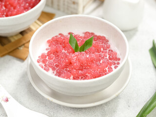 Bubur sagu mutiara, Indonesian dessert, made from sagu mutiara (pearls sago), coconut milk, sugar, pandanus leaves. Very famous during Ramadhan. Iftar food.
