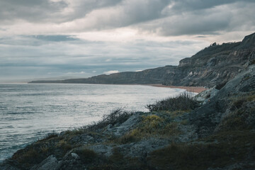 Fototapeta na wymiar View of a stormy sea from the rocks