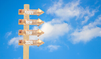 New year 2024 coming concept background photo. Wooden arrow shape sign board with Happy New Year 2024 text on it.