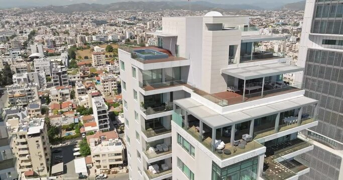 Aerial view apartments on the roof top in a high-rise modern building. Urban landscape. High quality 4k footage