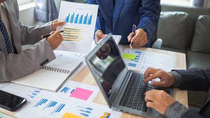  A group of businesspeople and investors meet to discuss market's success in past quarter. idea of setting up a marketing consulting team and working together as a team made it a success.
