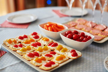 Different finger food snacks with cheese and vegetables