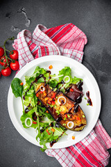eggplant salad green leaves fried vegetable meal snack on the table copy space food background rustic top view
