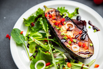 eggplant salad green leaves fried vegetable meal snack on the table copy space food background rustic top view