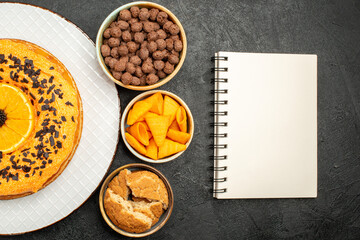 top view tasty sweet pie with orange slices on dark background pie cake dessert tea biscuit