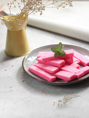 Wafers in ceramics plate. Wafers are crispy biscuits, thin, layered and chocolate contents, can also be used to decorate ice