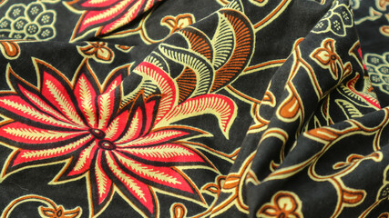 A traditional Indonesian fabric, namely batik cloth which has unique and different patterns and image motifs for each region. Cultural theme photos, typical of Asia.