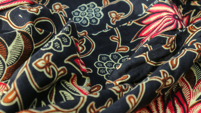 A traditional Indonesian fabric, namely batik cloth which has unique and different patterns and image motifs for each region. Cultural theme photos, typical of Asia.