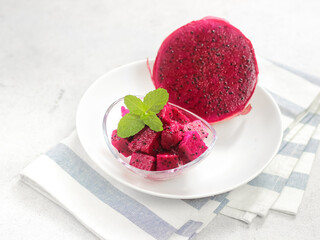 dragon fruit slice in bowl. tropical healthy fruit concept
