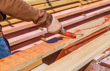 Treat the wooden board with an antiseptic. Selective focus.