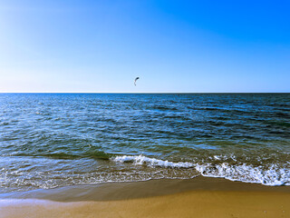 Kite surfer rides on the water in Staoueli, Algeria