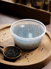A cup soaked basil seeds. Basil seeds are useful for relieving heartburn.